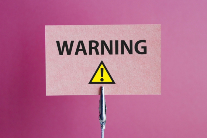 WARNINGと書かれた紙